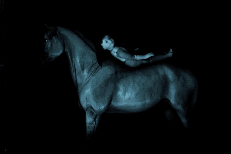 Surreal photo of a blue horse